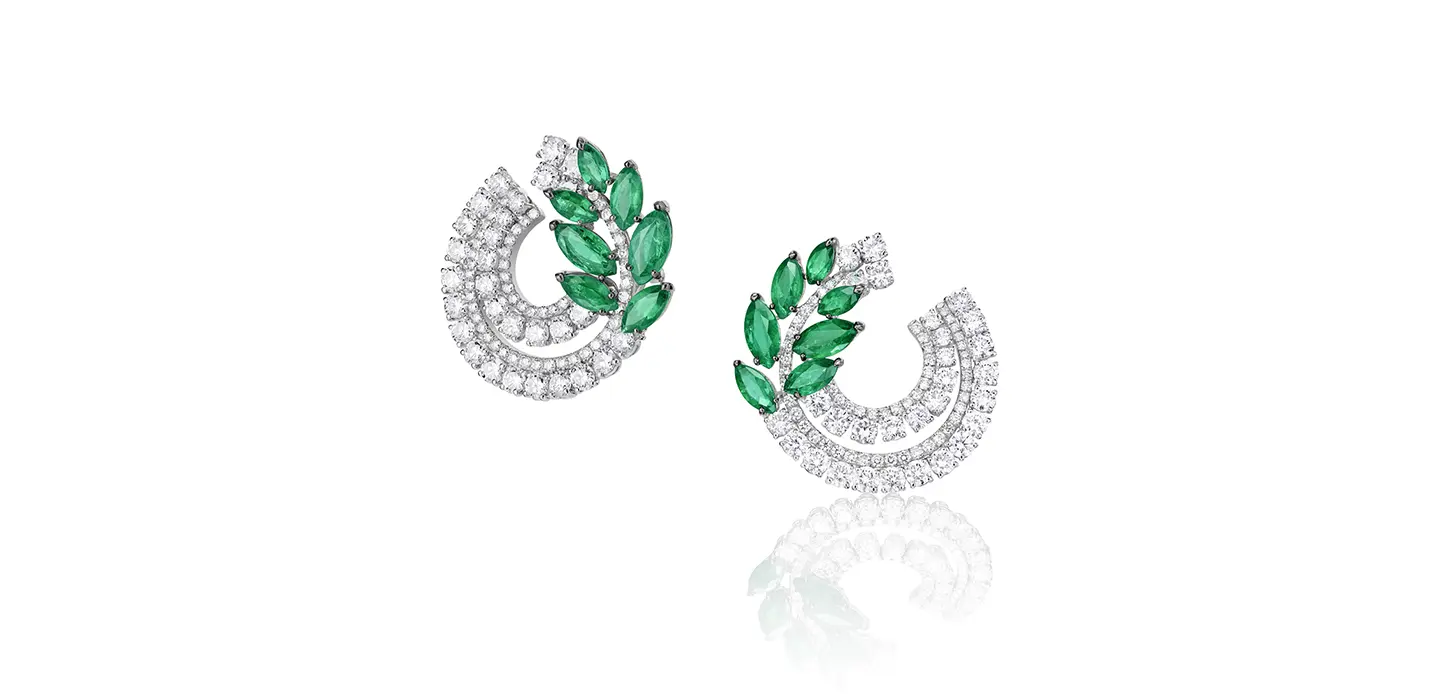 Laurea earrings in white gold set with emerlads