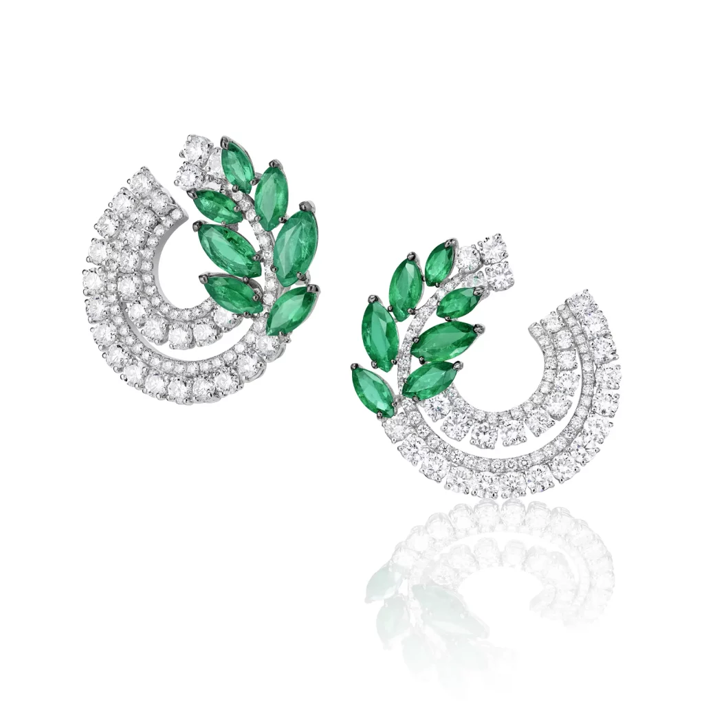 Laurea earrings in white gold set with emerlads