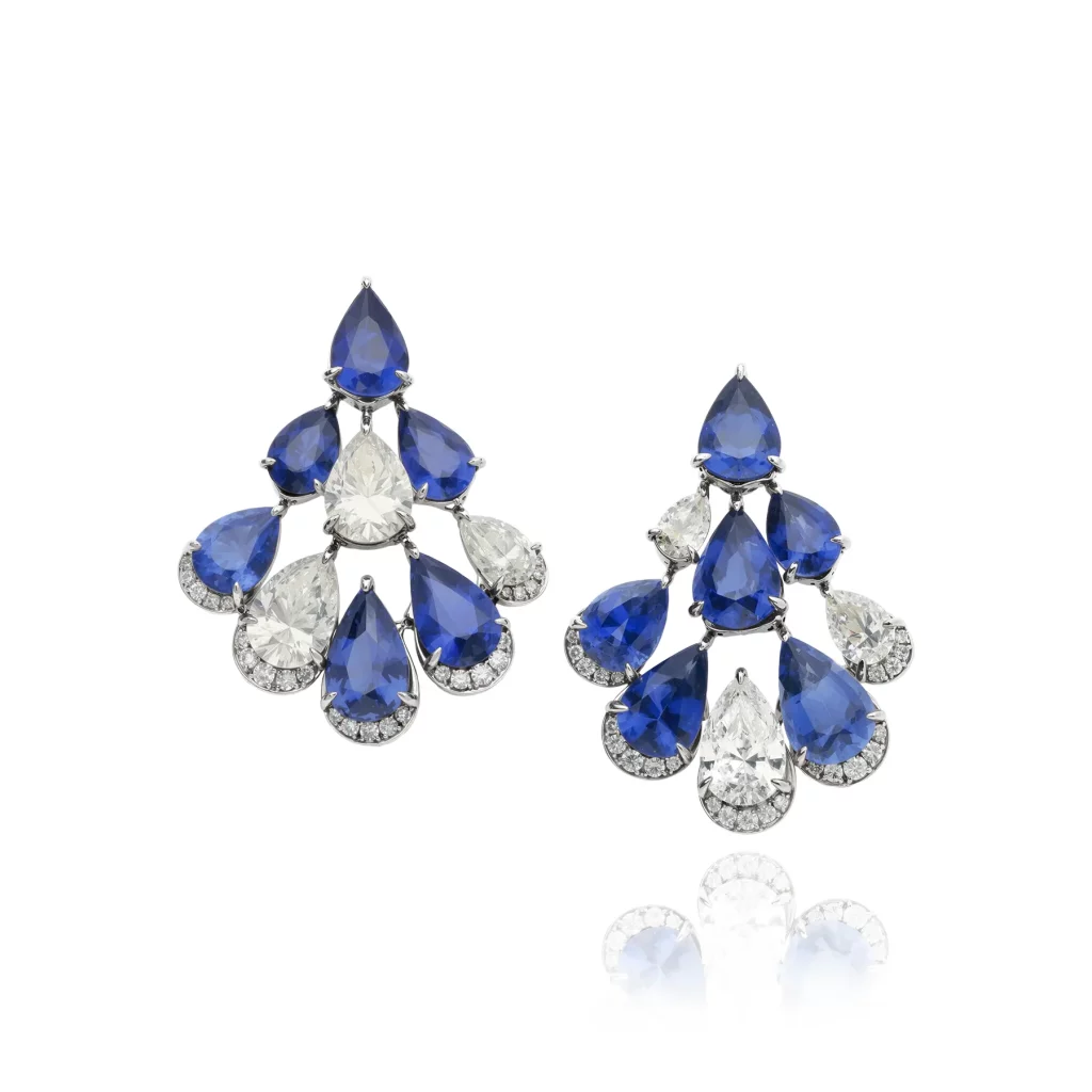 Earrings set with pear shaped Diamonds and Sapphires